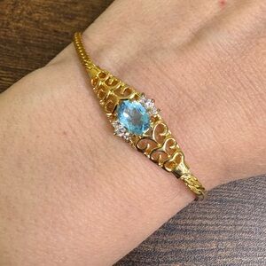 Avon Gold Tone Filigree Chain Bracelet with Blue Rhinestone